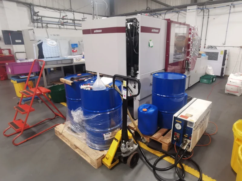 MI240 Lubricant Being Filled into Wittmann SmartPower Moulding Machine